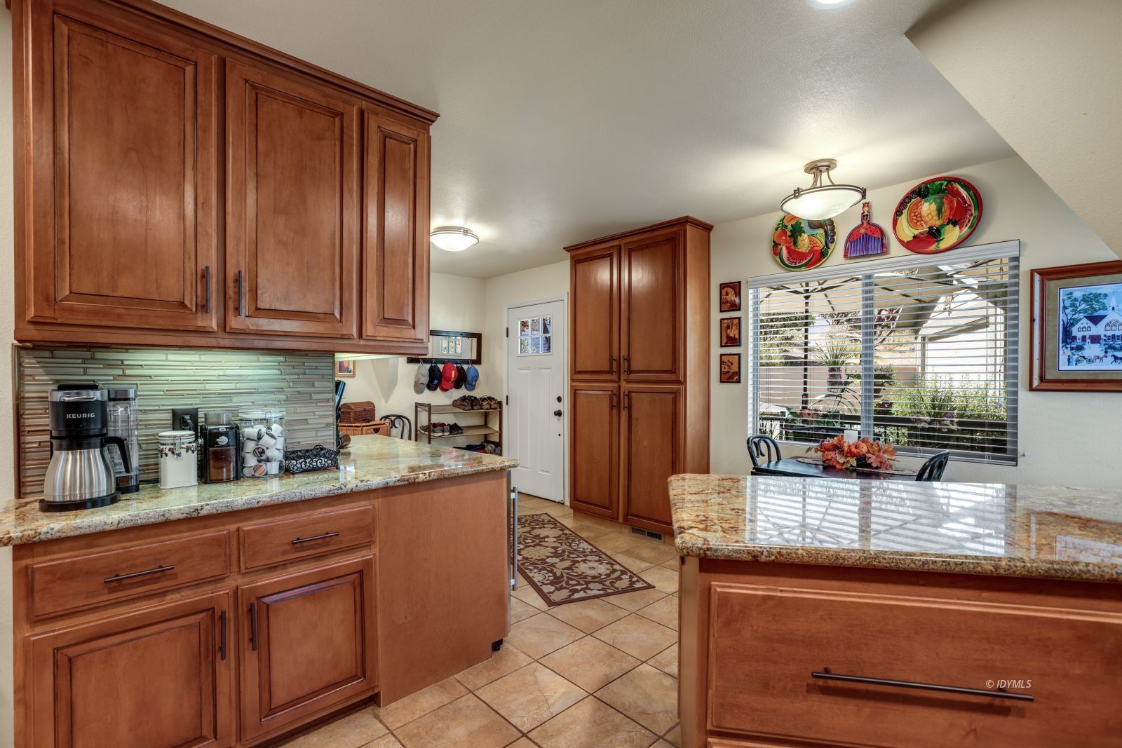 53599 West Ridge Road Idyllwild, CA 92549 - Photo 22 of 49 a kitchen with stainless steel appliances granite countertop a refrigerator and a stove top oven