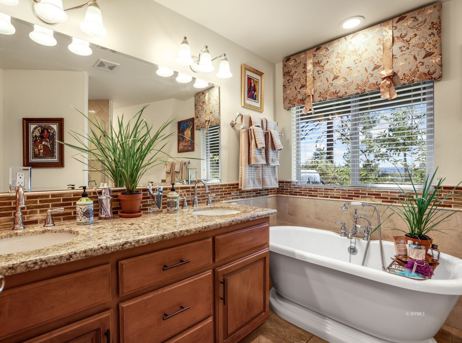 53599 West Ridge Road Idyllwild, CA 92549 - Photo 28 of 49 a bathroom with a granite countertop sink mirror and bathtub