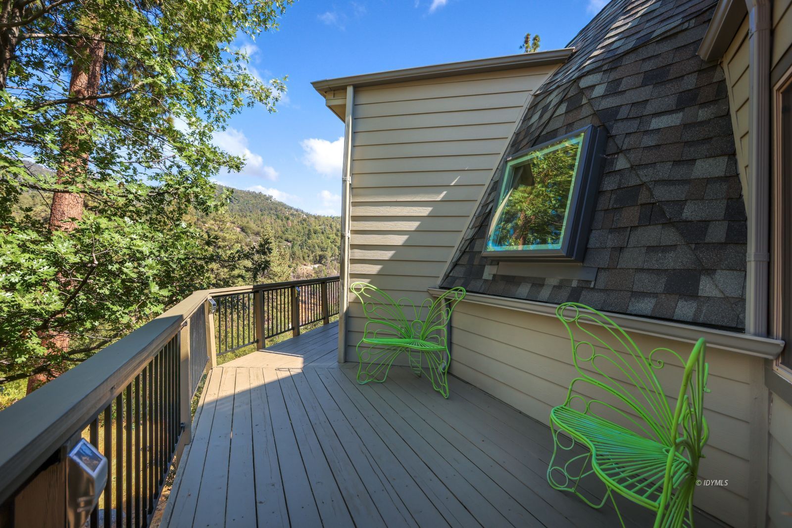 53599 West Ridge Road Idyllwild, CA 92549 - Photo 41 of 49 a view of a balcony with chairs