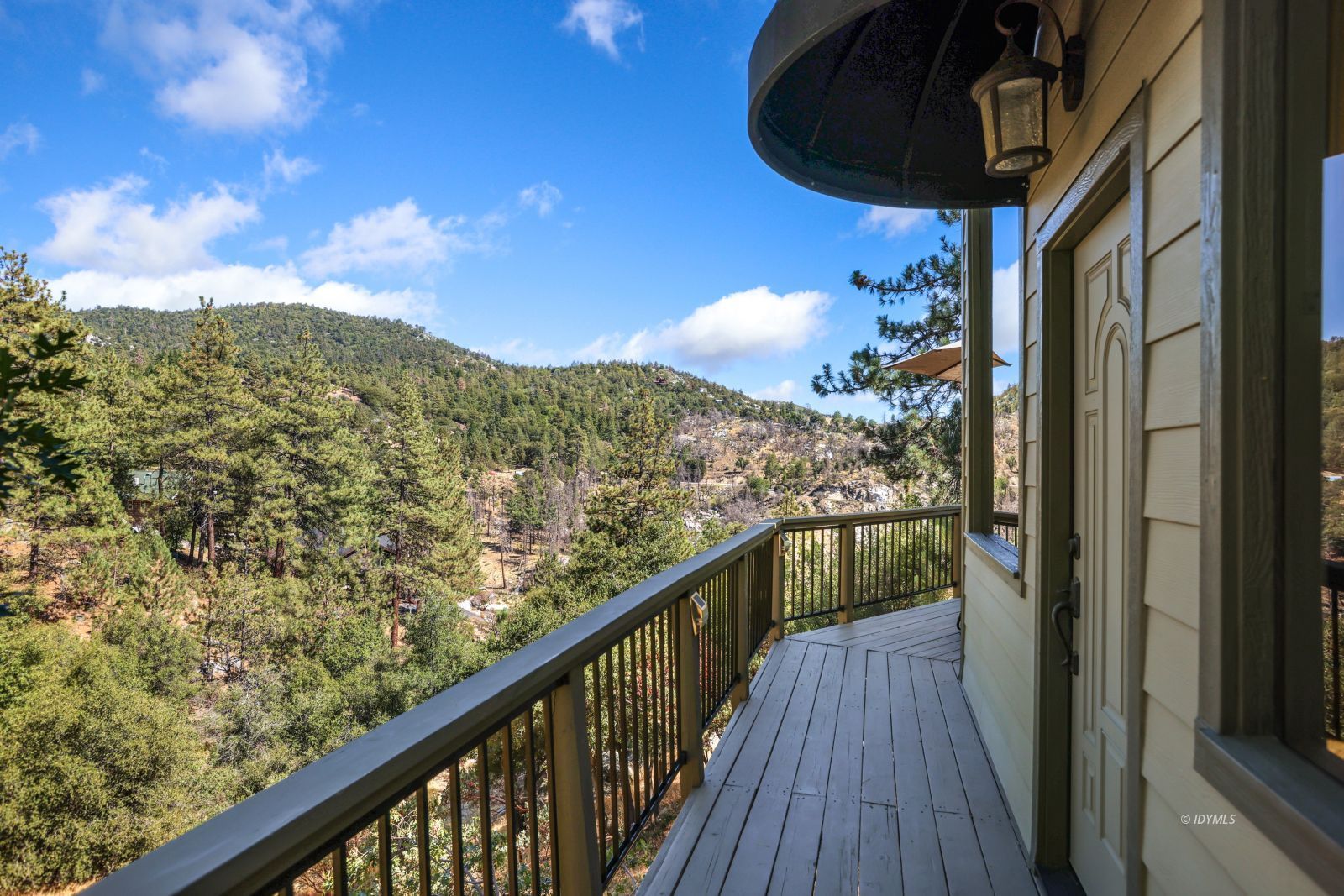 53599 West Ridge Road Idyllwild, CA 92549 - Photo 42 of 49 a view of a balcony with wooden floor and stairs