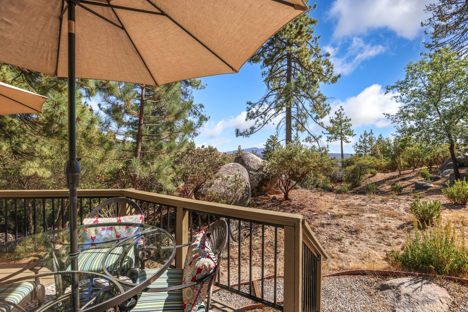 53599 West Ridge Road Idyllwild, CA 92549 - Photo 46 of 49 a view of a chair and table in the balcony