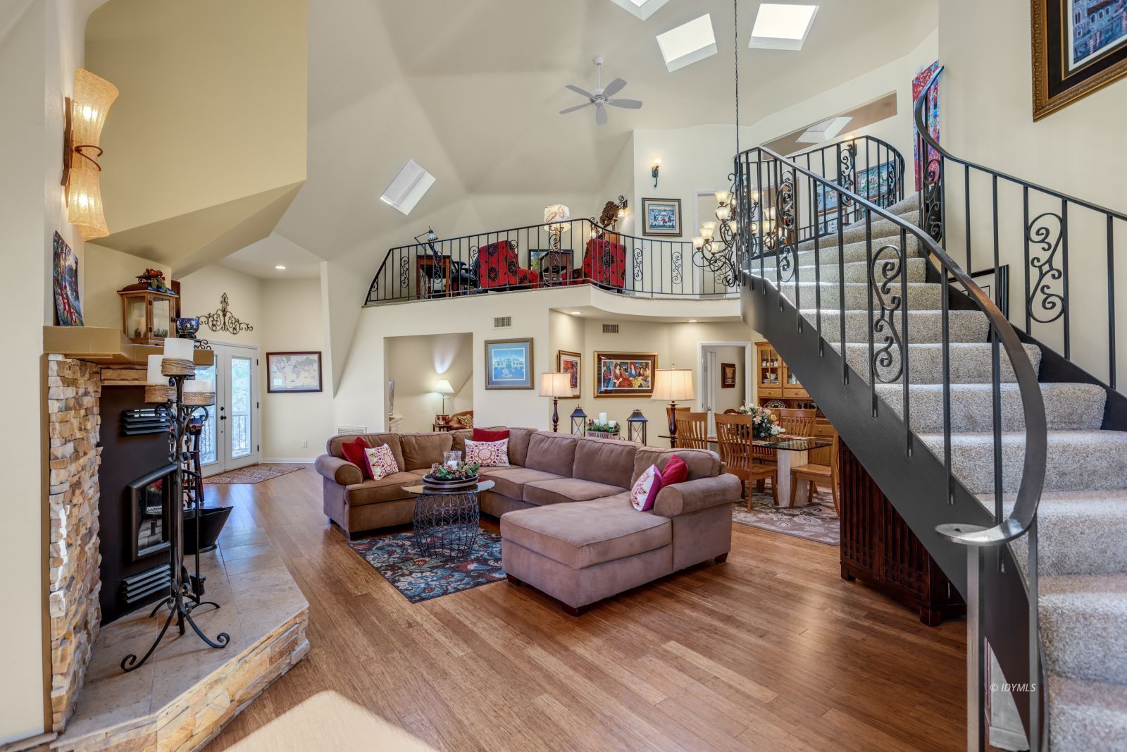 53599 West Ridge Road Idyllwild, CA 92549 - Photo 7 of 49 a living room with furniture or stairs and a wooden floor