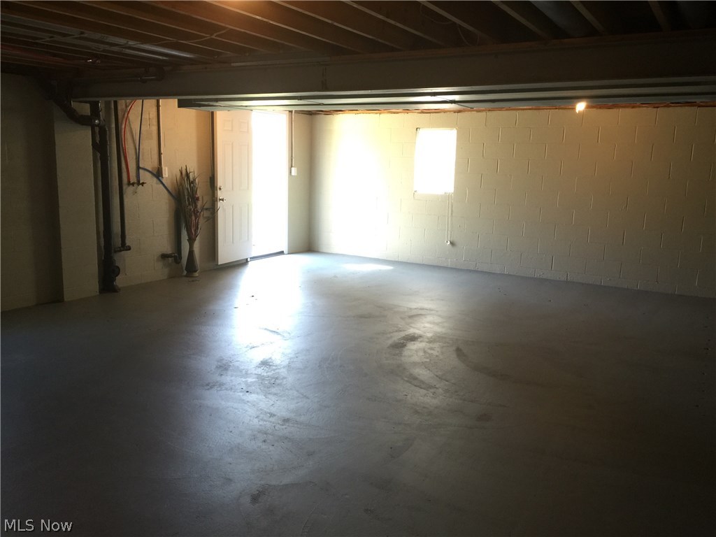 1037 Portage Line Road Mogadore, OH 44260 - Photo 14 of 18 A view of the large basement that is a walk out to the back yard.