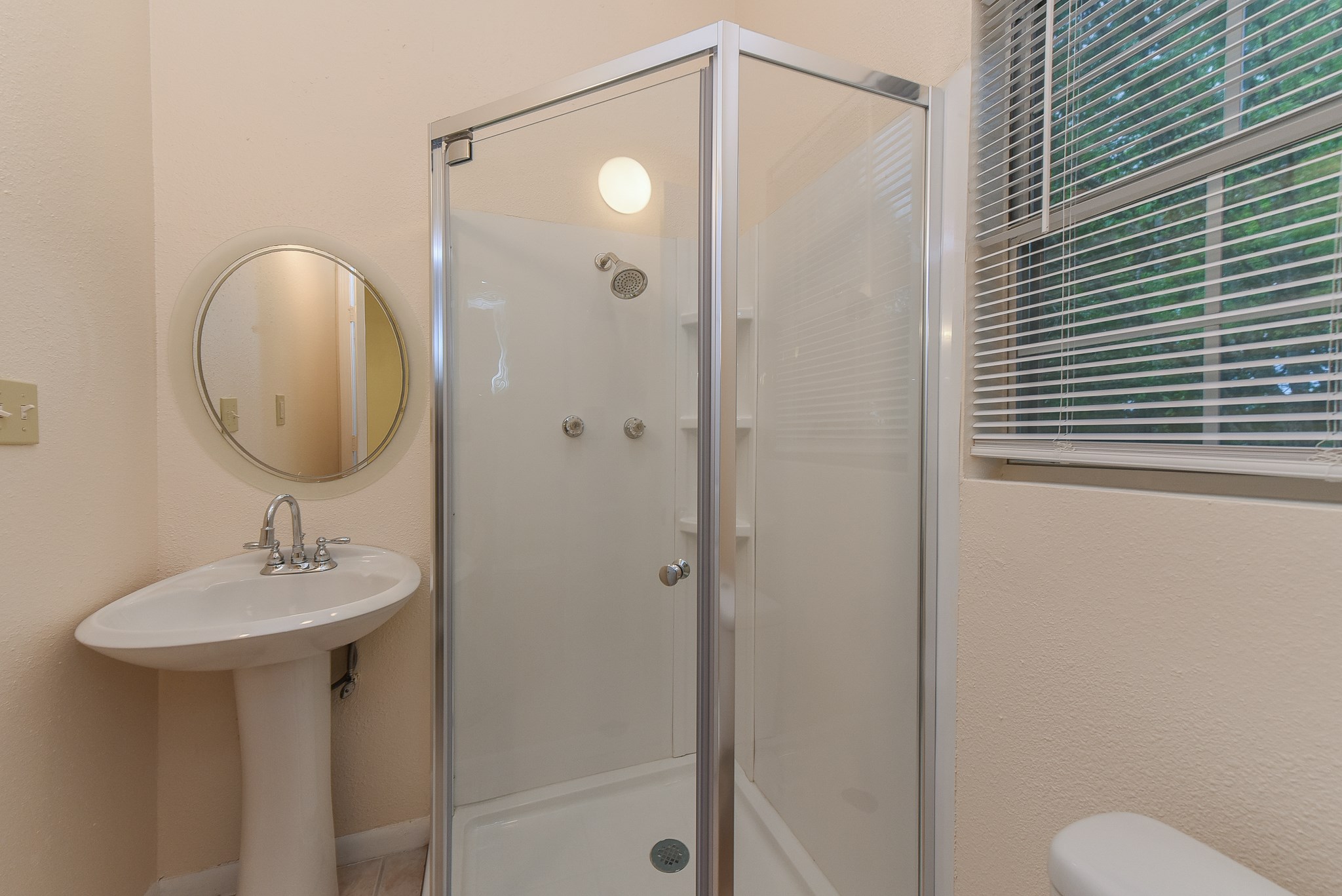 18610 Anne Drive Webster, TX 77058 - Photo 18 of 50 a bathroom with a sink toilet and shower