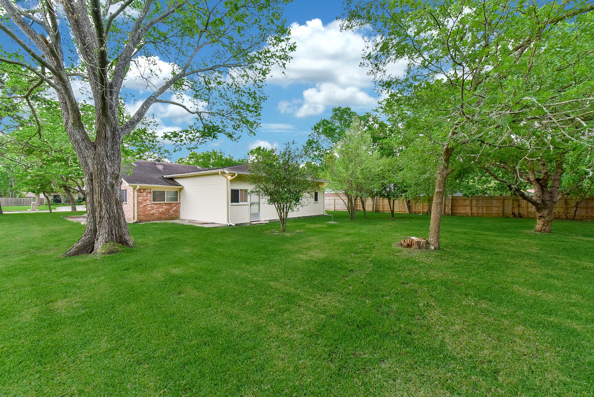 18610 Anne Drive Webster, TX 77058 - Photo 46 of 50 a view of a house with a backyard