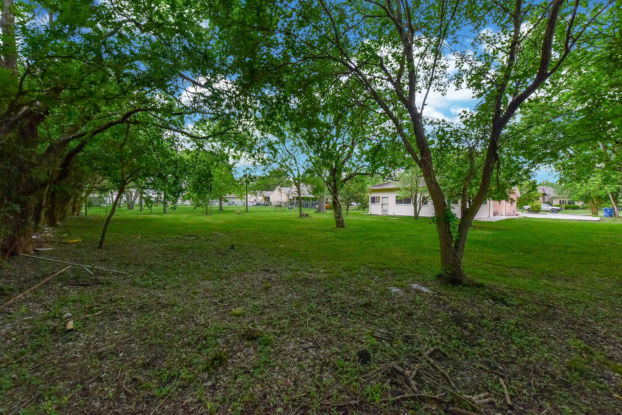 18610 Anne Drive Webster, TX 77058 - Photo 48 of 50 a view of grassy field with benches