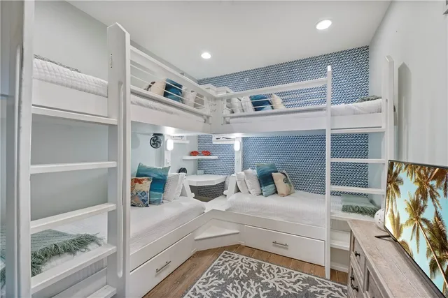 a kitchen with a refrigerator and a sink