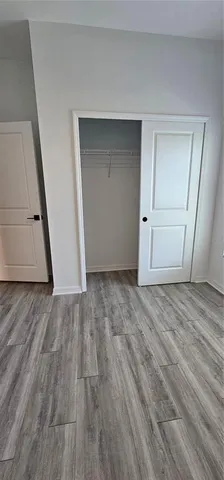 a bathroom with a sink a toilet and a shower