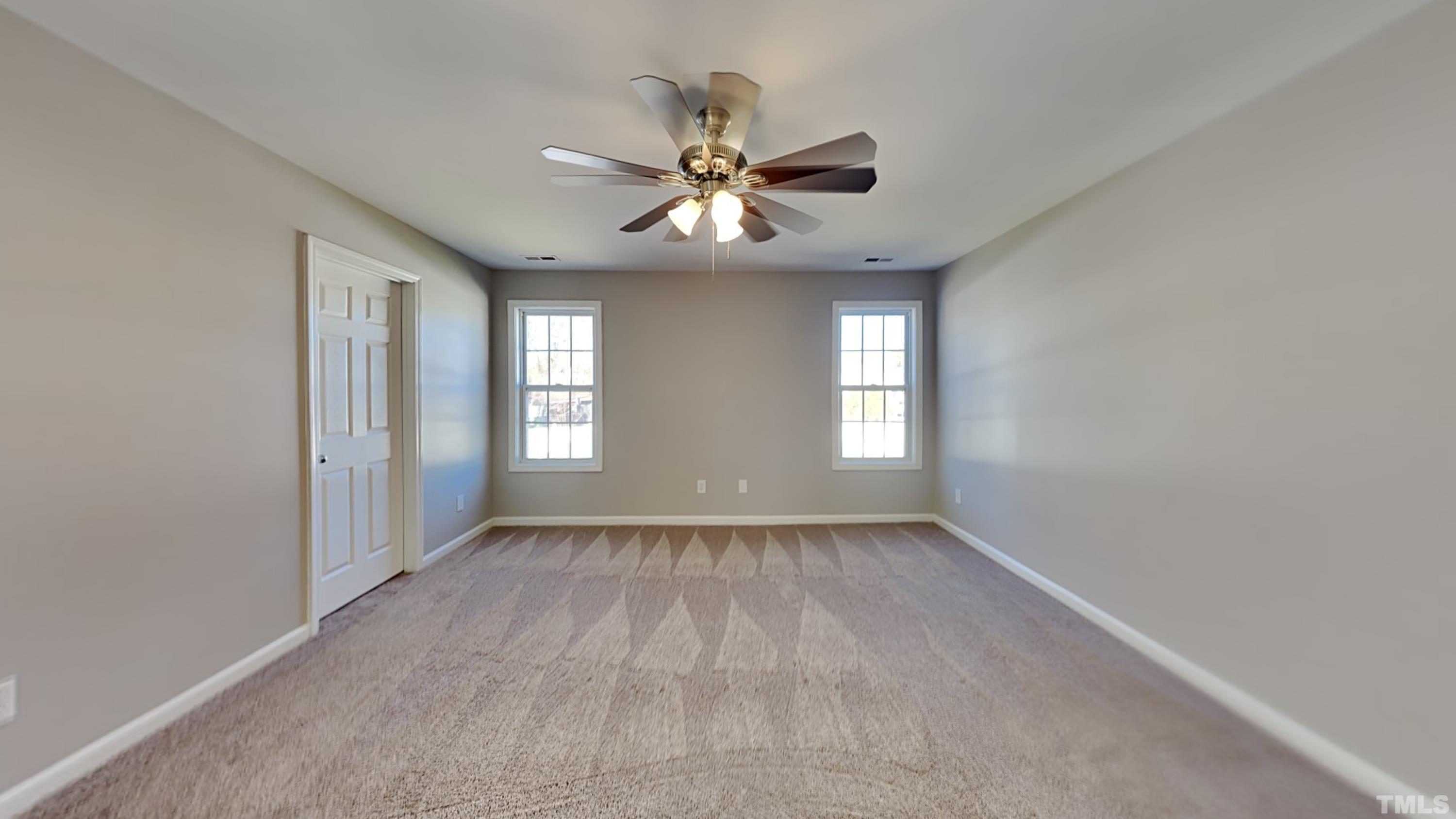 3602 Rendition Street Raleigh, NC 27610 - Photo 6 of 13 a view of an empty room with a window