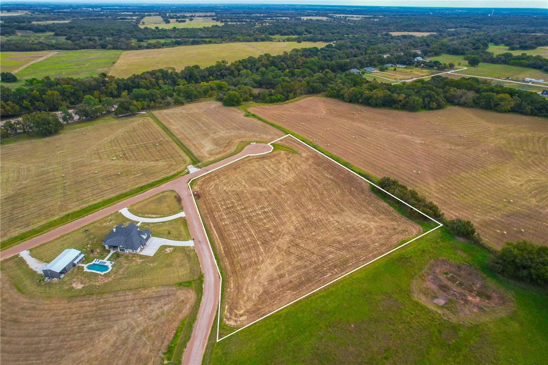 1400 Rd China Spring China Spring, TX 76633 - Photo 1 of 1 an aerial view of a house with a yard and lake view