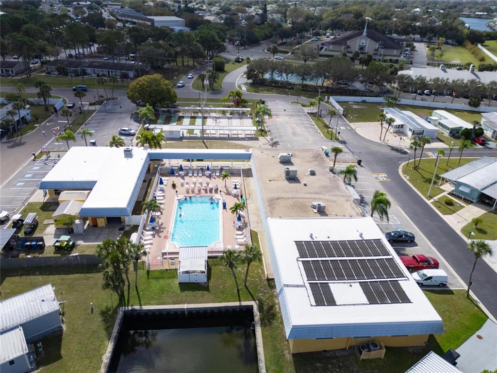 101 St Johns Way West Apollo Beach, FL 33572 - Photo 17 of 24 aerial view of a house with swimming pool and outdoor seating