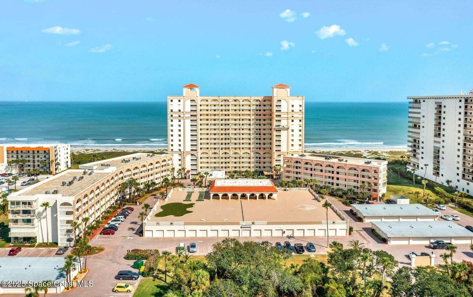 840 North Atlantic Avenue, Unit C103 Cocoa Beach, FL 32931 - Photo 26 of 30 a view of a city with an ocean view