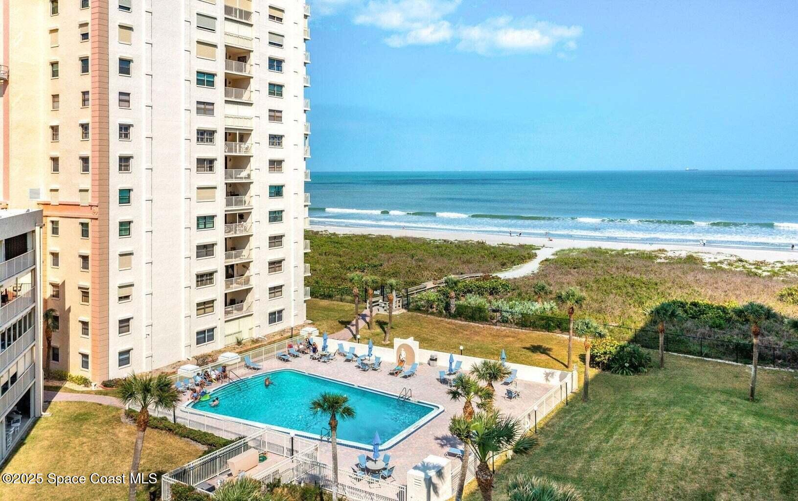 840 North Atlantic Avenue, Unit C103 Cocoa Beach, FL 32931 - Photo 27 of 30 a view of a city with an ocean view