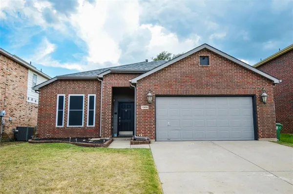 a front view of house with garage