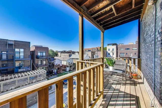 a view of balcony with furniture