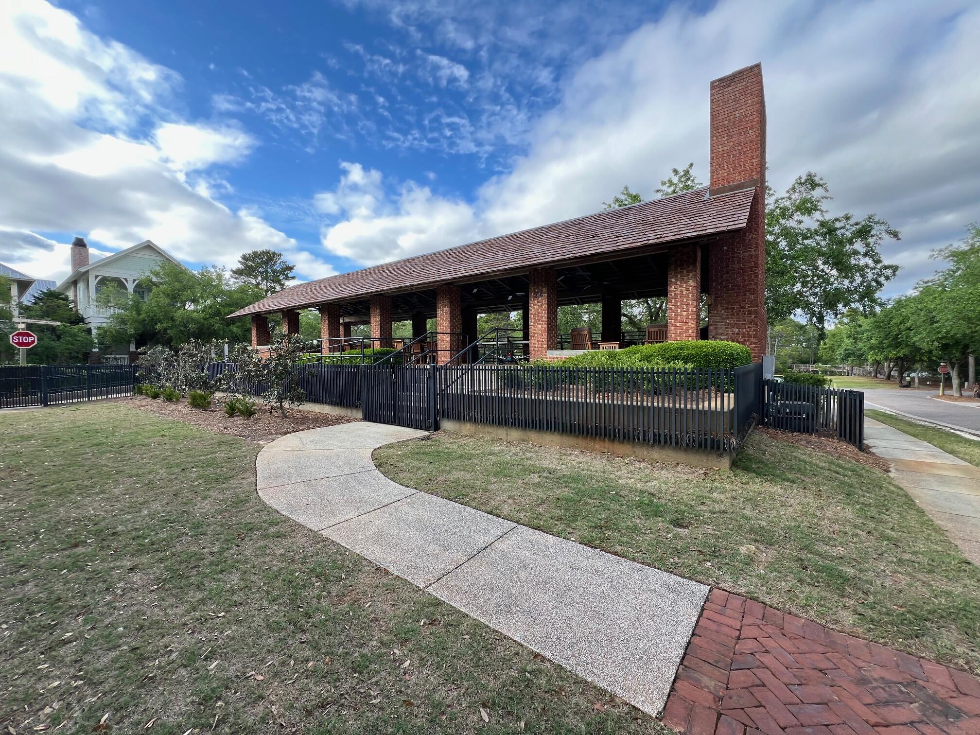 Lot 5 West Okeechobee Santa Rosa Beach Santa Rosa Beach, FL 32459 - Photo 23 of 28 a front view of a house with garden