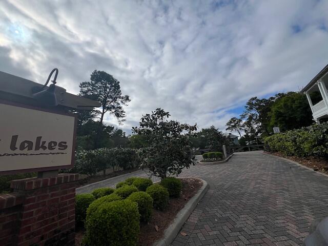 Lot 5 West Okeechobee Santa Rosa Beach Santa Rosa Beach, FL 32459 - Photo 4 of 28 a picture of a tree in a backyard