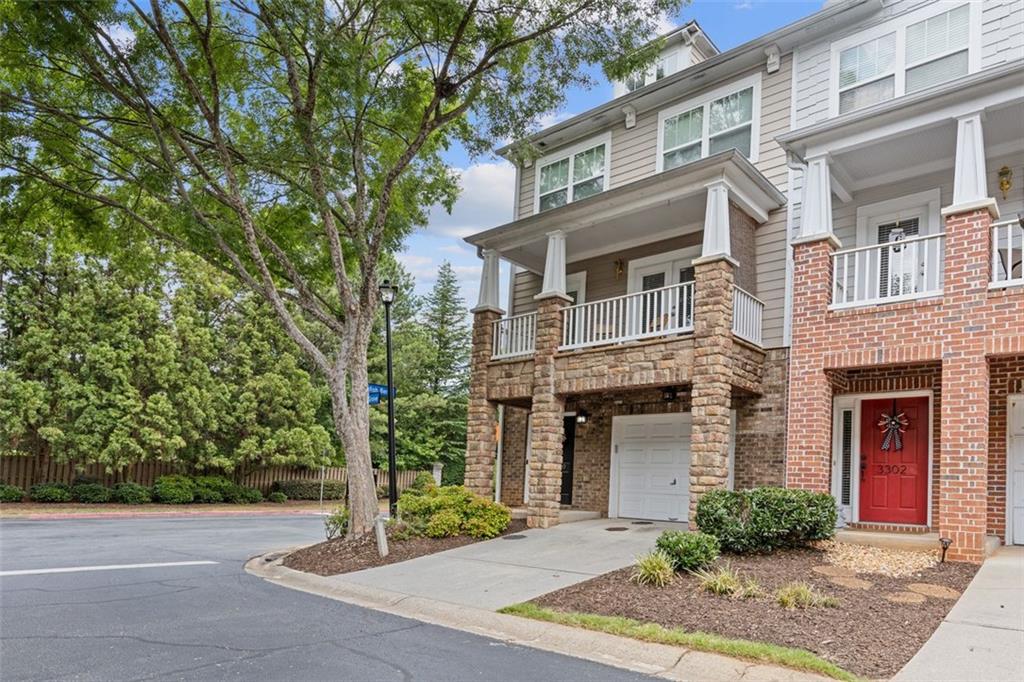 3300 Regatta Grove Alpharetta, GA 30004 - Photo 1 of 1 a front view of a house with garden