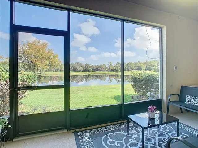 a living room with large windows