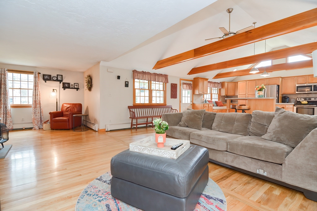 143 South Meadow Road Plymouth, MA 02360 - Photo 14 of 35 a living room with furniture kitchen view and a large window