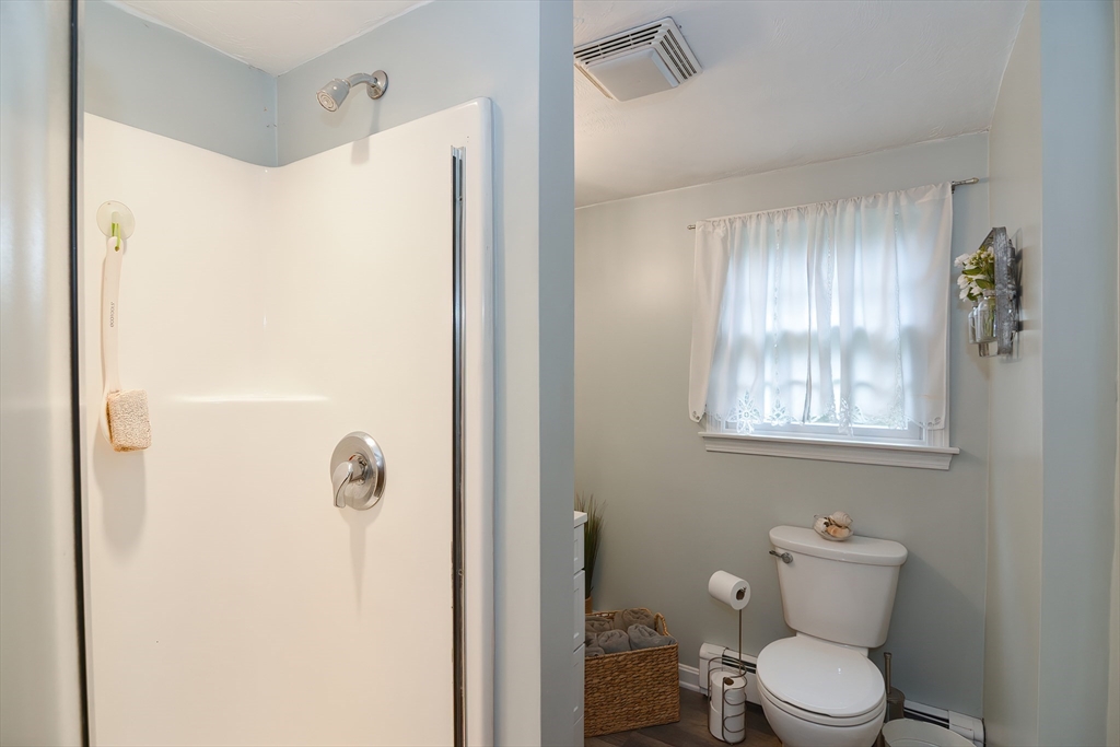 143 South Meadow Road Plymouth, MA 02360 - Photo 18 of 35 a bathroom with a toilet sink and shower