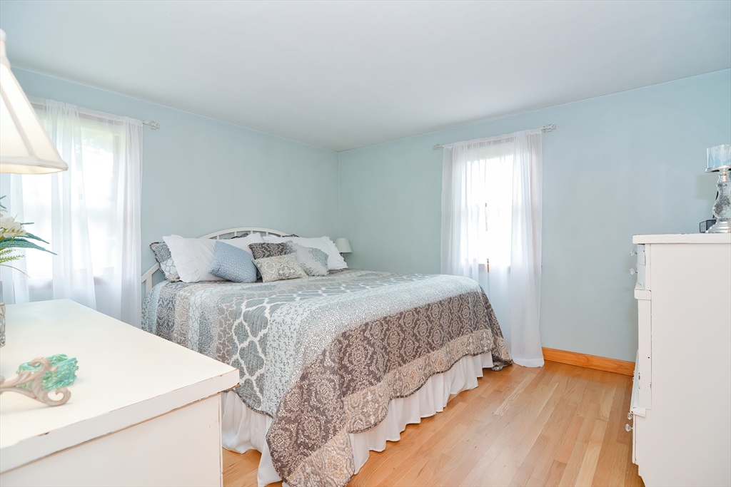 143 South Meadow Road Plymouth, MA 02360 - Photo 19 of 35 a bedroom with two beds and a table