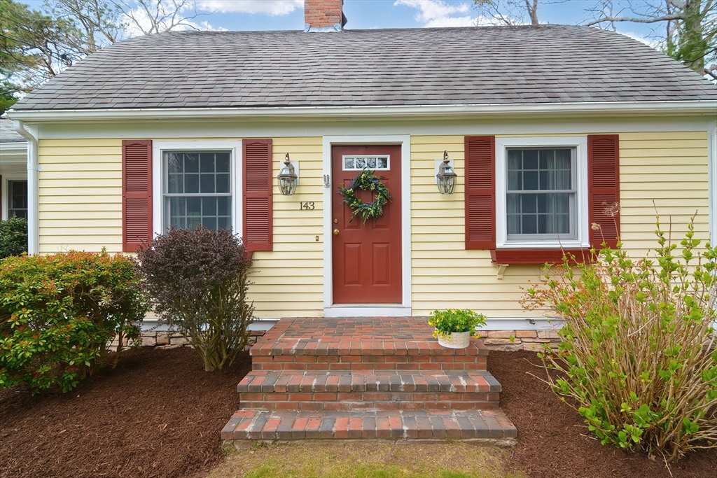 143 South Meadow Road Plymouth, MA 02360 - Photo 2 of 35 a front view of a house with a yard