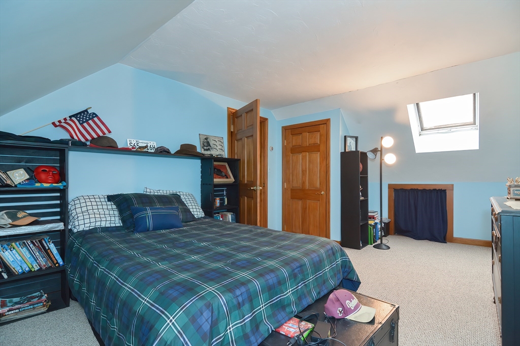 143 South Meadow Road Plymouth, MA 02360 - Photo 22 of 35 a bedroom with a bed and a closet