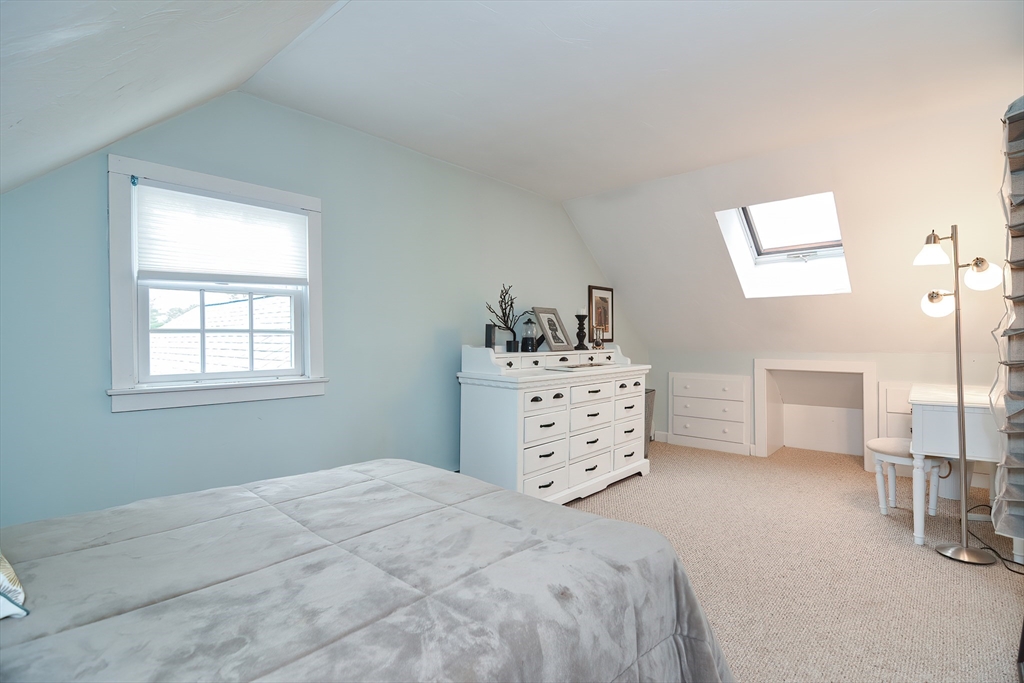 143 South Meadow Road Plymouth, MA 02360 - Photo 25 of 35 a bedroom with a bed and a dresser