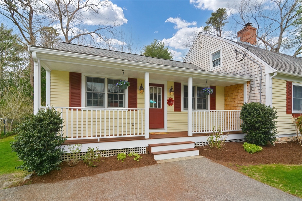 143 South Meadow Road Plymouth, MA 02360 - Photo 3 of 35 front view of a house with a street