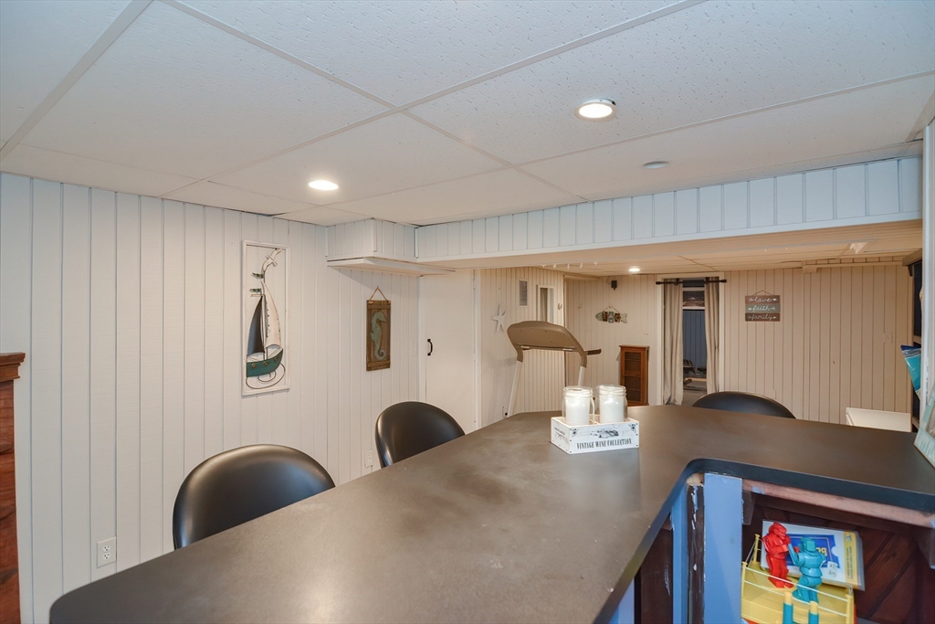 143 South Meadow Road Plymouth, MA 02360 - Photo 33 of 35 a view of kitchen and dining area with chandelier