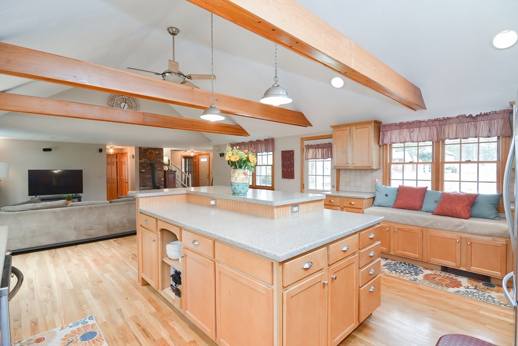 143 South Meadow Road Plymouth, MA 02360 - Photo 10 of 35 a kitchen with stainless steel appliances granite countertop a sink and a stove