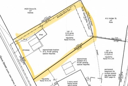 0 Grove Street Worcester, MA 01609 - Photo 2 of 9 a view of a hallway with a large window and potted plants