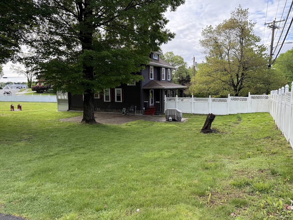 0 Grove Street Worcester, MA 01609 - Photo 5 of 9 a view of a house with a backyard