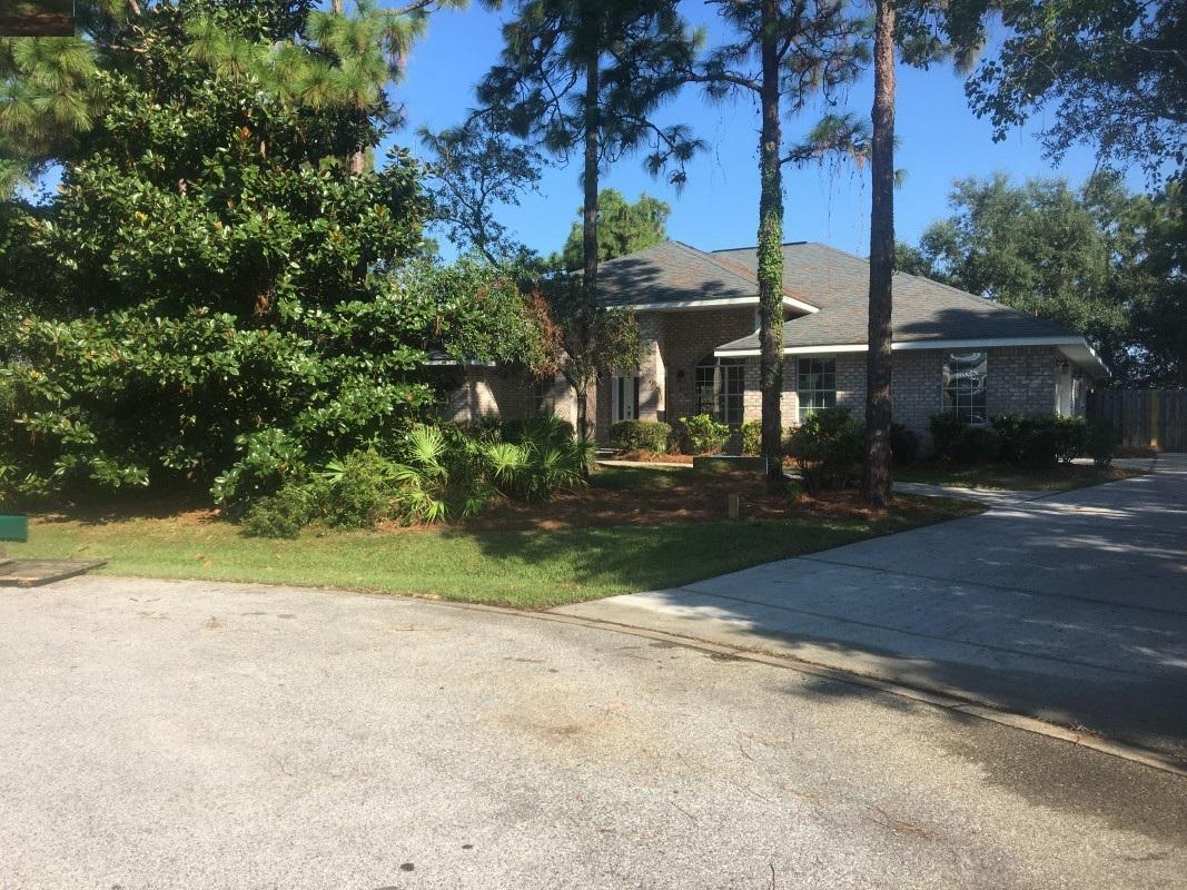 237 Buck Road Santa Rosa Beach, FL 32459 - Photo 1 of 2 a view of street with houses