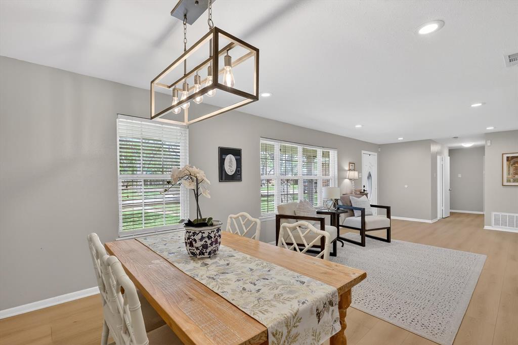 2920 Sharpview Lane Dallas, TX 75228 - Photo 13 of 34 Dining area with light wood finished floors and recessed lighting