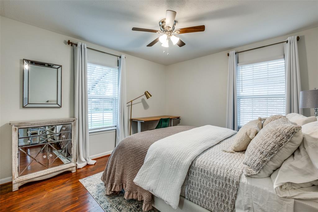 2920 Sharpview Lane Dallas, TX 75228 - Photo 19 of 34 Bedroom featuring dark wood-style floors and ceiling fan