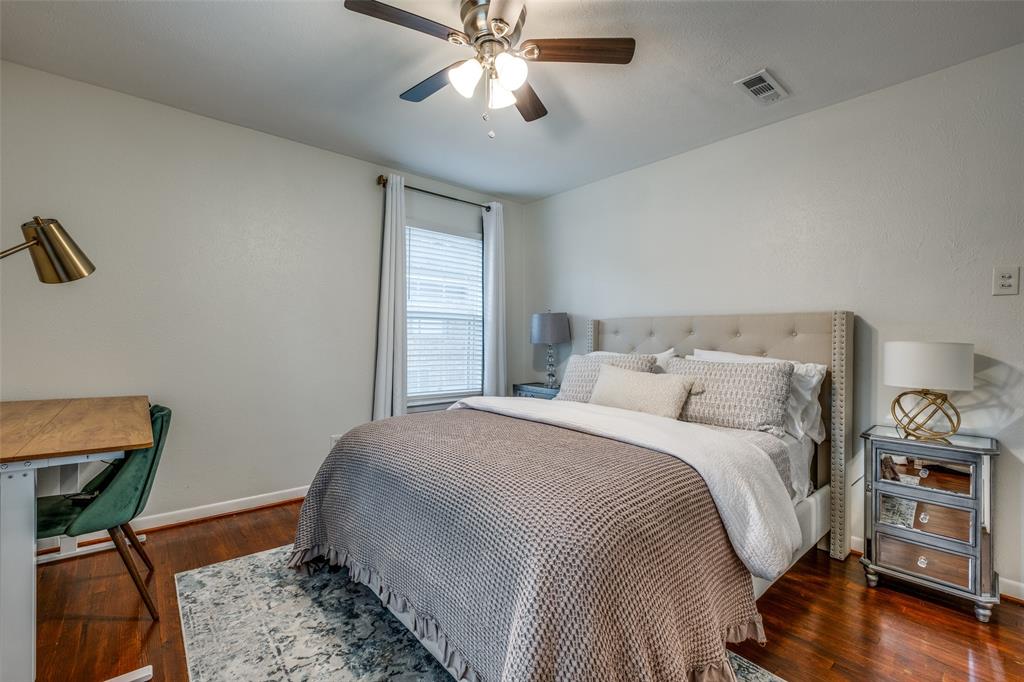 2920 Sharpview Lane Dallas, TX 75228 - Photo 21 of 34 Bedroom featuring dark wood-style floors and ceiling fan