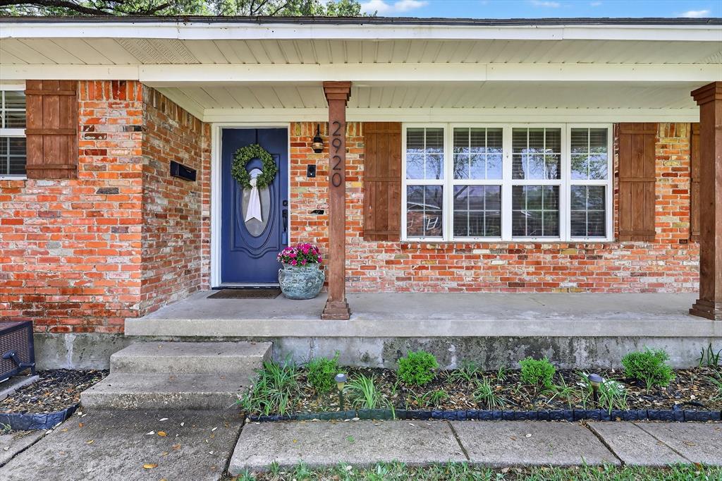 2920 Sharpview Lane Dallas, TX 75228 - Photo 3 of 34 Entrance to property with brick siding and a porch