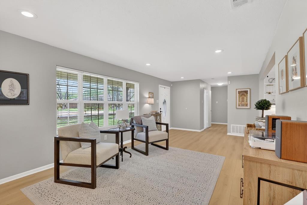 2920 Sharpview Lane Dallas, TX 75228 - Photo 5 of 34 Living area with light wood finished floors and recessed lighting