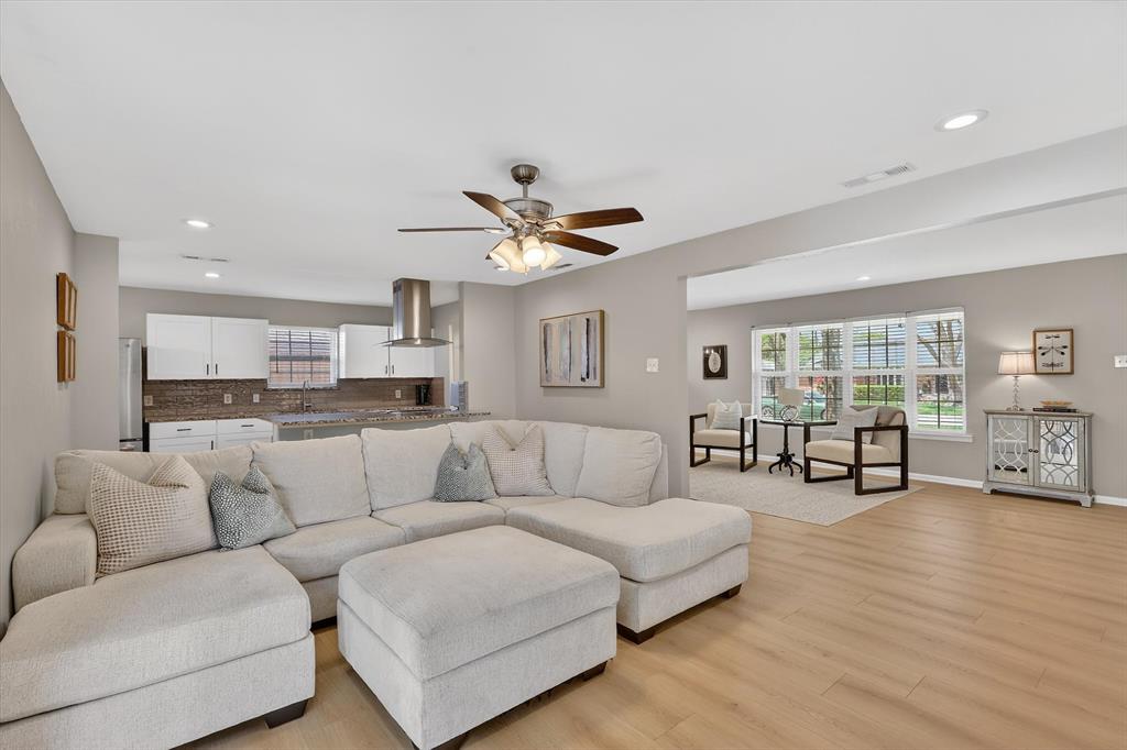 2920 Sharpview Lane Dallas, TX 75228 - Photo 8 of 34 Living room featuring a ceiling fan, light wood-type flooring, and recessed lighting