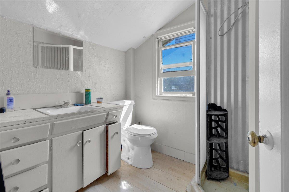 379 Corral De Tierra Road Salinas, CA 93908 - Photo 32 of 47 a bathroom with a sink toilet and shower