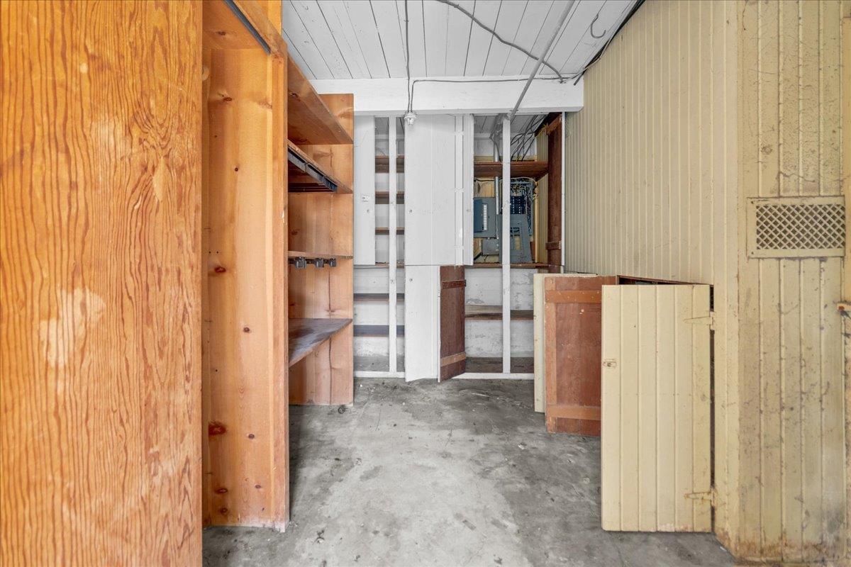 379 Corral De Tierra Road Salinas, CA 93908 - Photo 34 of 47 a view of a hallway with a refrigerator and a window