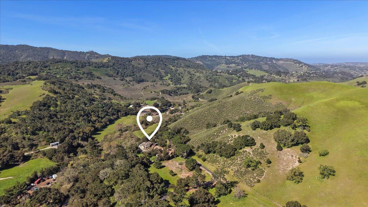 379 Corral De Tierra Road Salinas, CA 93908 - Photo 45 of 47 a view of a lake with mountains in the background