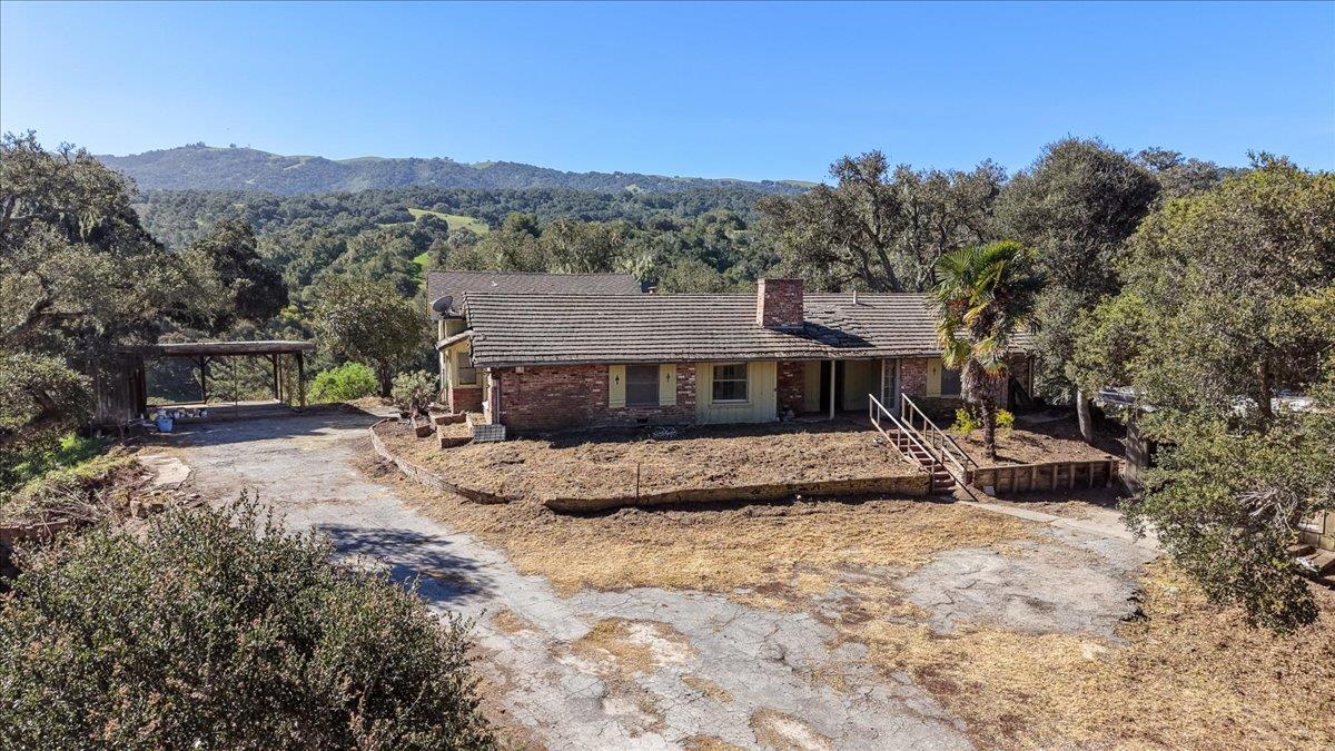 379 Corral De Tierra Road Salinas, CA 93908 - Photo 5 of 47 a view of a house with a yard and sitting area
