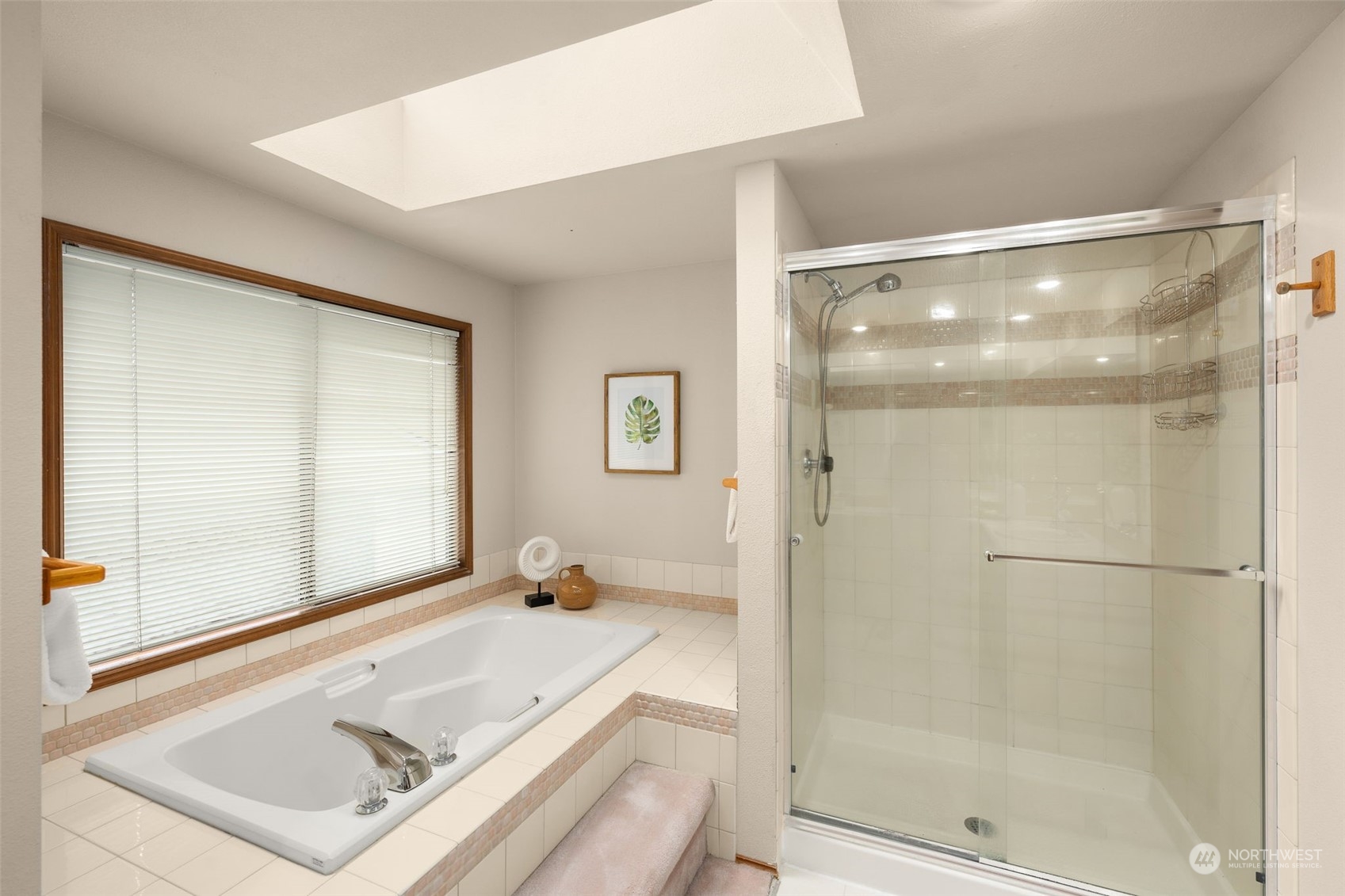 15518 Southeast 183rd Drive Renton, WA 98058 - Photo 24 of 35 a bathroom with a tub shower and sink
