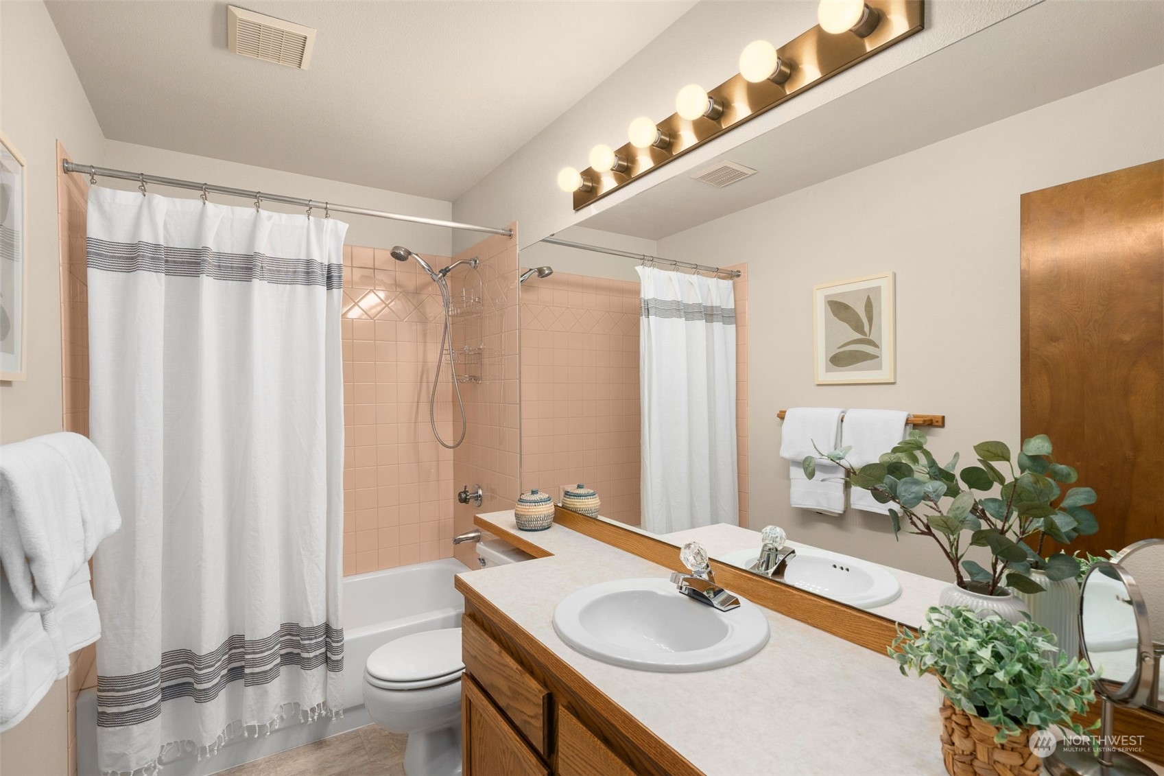 15518 Southeast 183rd Drive Renton, WA 98058 - Photo 31 of 35 a bathroom with a granite countertop sink and a mirror