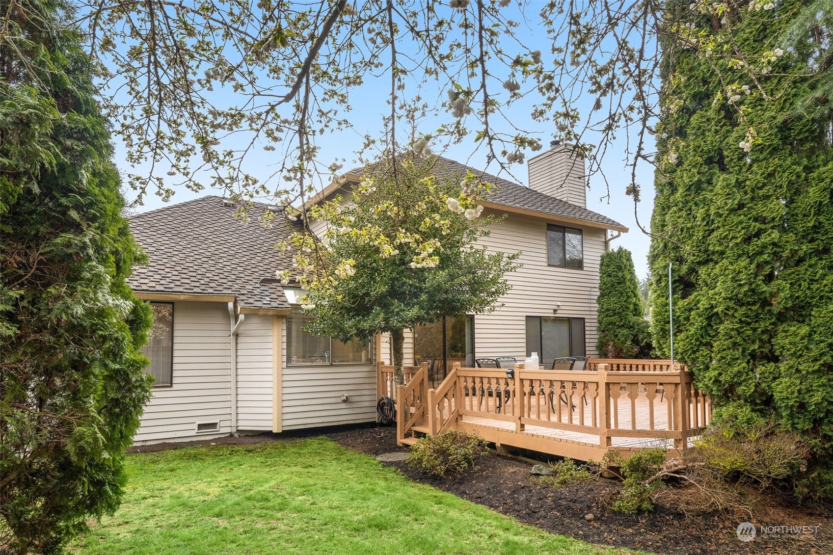 15518 Southeast 183rd Drive Renton, WA 98058 - Photo 34 of 35 a view of a house with a yard and deck