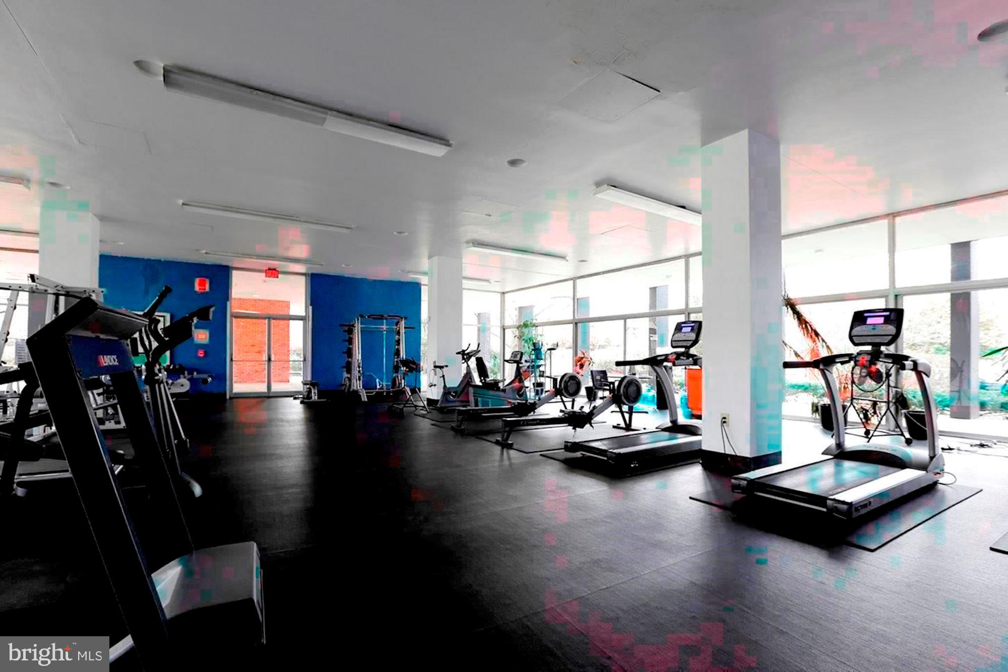 1311 Delaware Avenue Southwest, Unit S346 Washington, DC 20024 - Photo 14 of 23 a view of a room with gym equipment