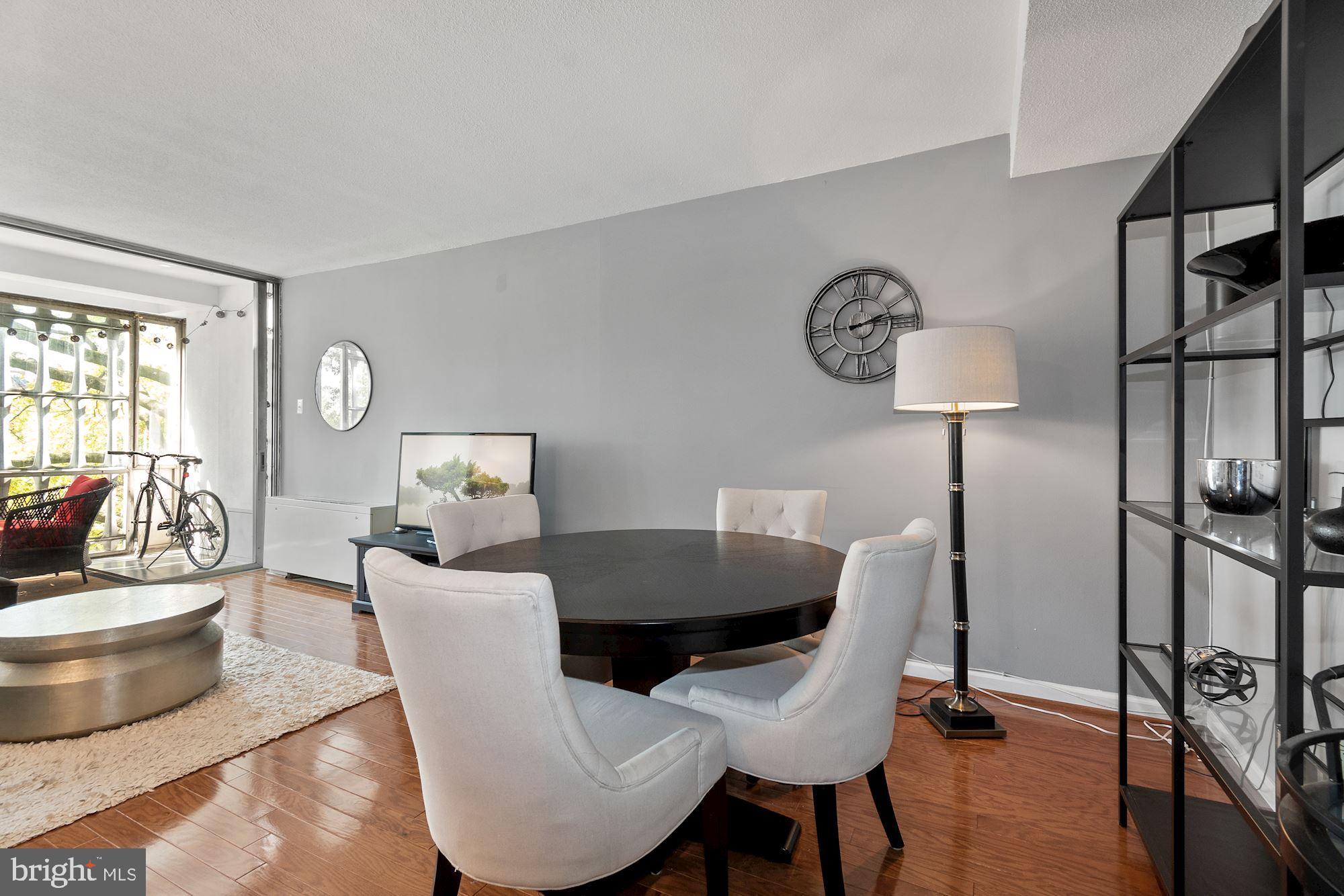 1311 Delaware Avenue Southwest, Unit S346 Washington, DC 20024 - Photo 5 of 23 a view of a dining room with furniture